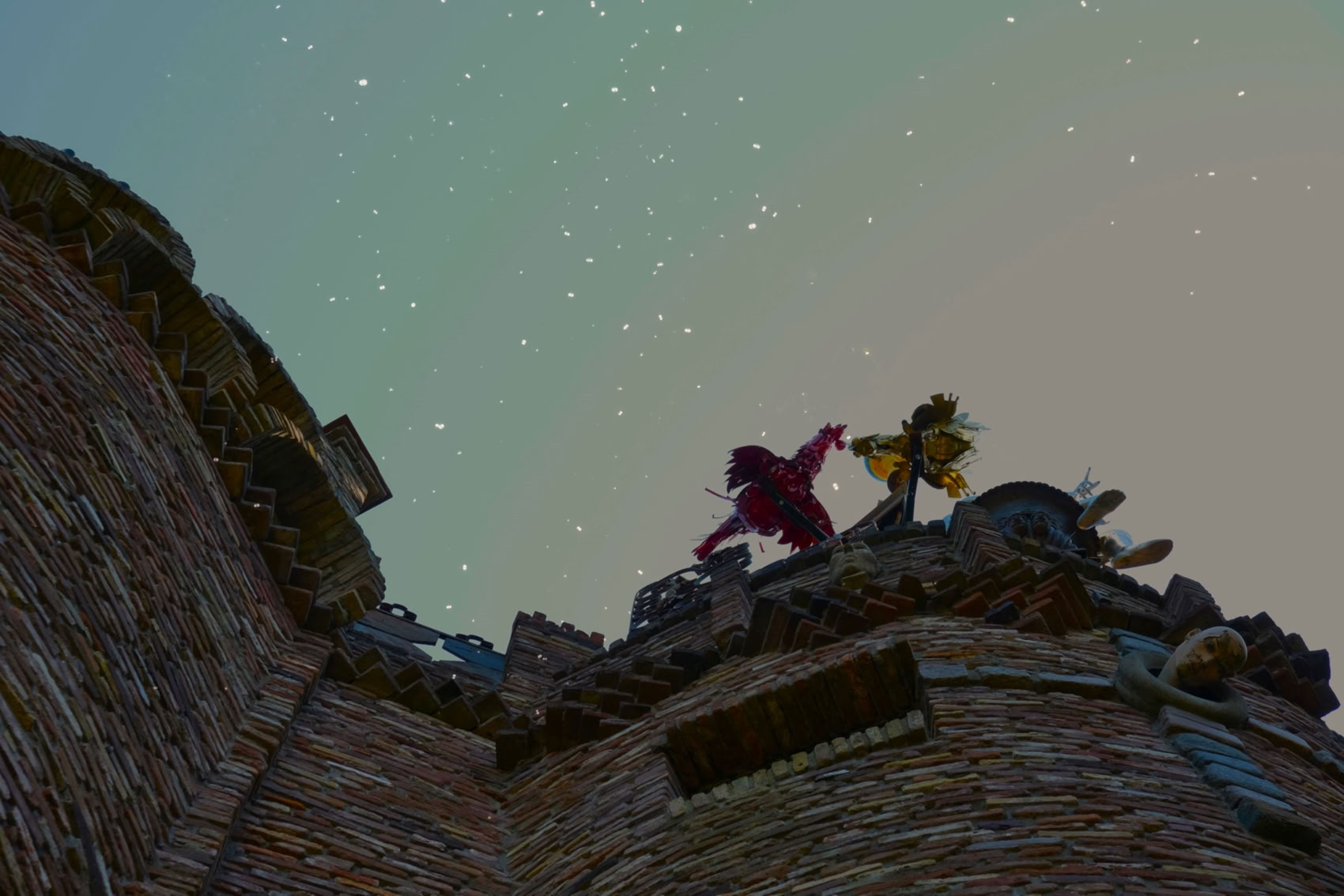 Two "birds" standing on a brick structure under a starry sky.